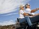 adult couple riding the motorcycle