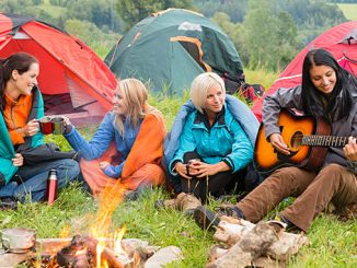 girls camping in the mountains