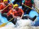 group of men rafting river