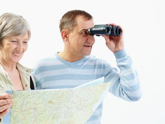 happy senior couple traveling