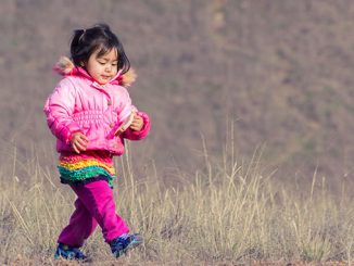 little girl walking hiking