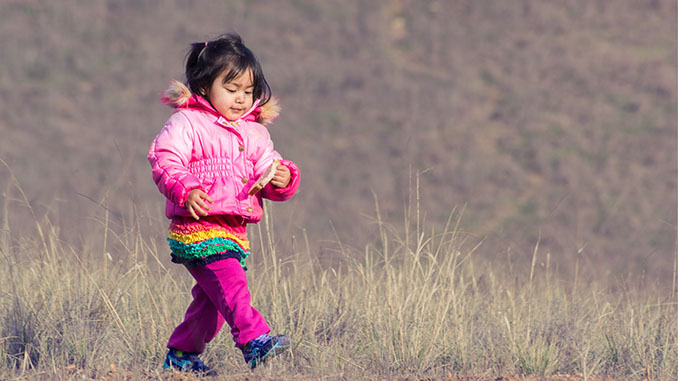 little girl walking hiking