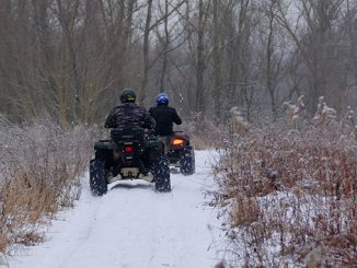 men with atv winter