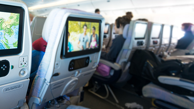 People on board looking at seat monitors