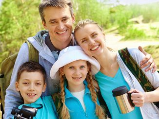 Portrait Of Family Of Travelers
