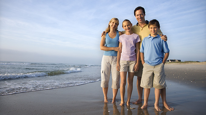 Smiling family on beach