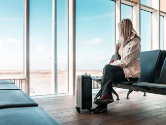 woman traveler waiting at airport