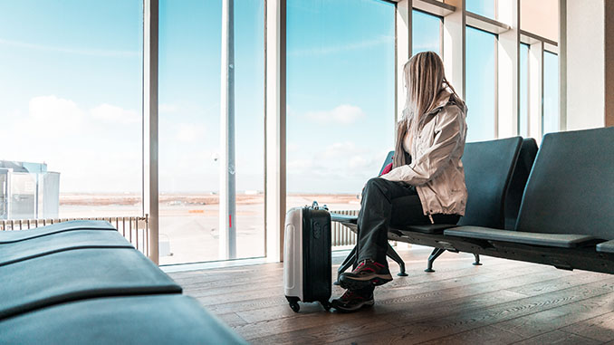 woman traveler waiting at airport