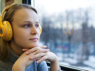 Woman traveling by train