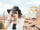 woman traveler taking photos