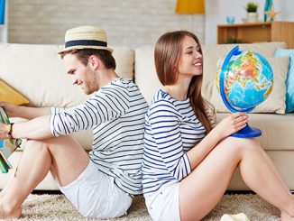 Young couple thinking of where to go traveling